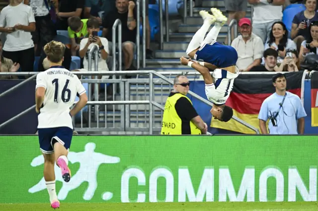 Omari Hutchinson backflips to celebrate his goal