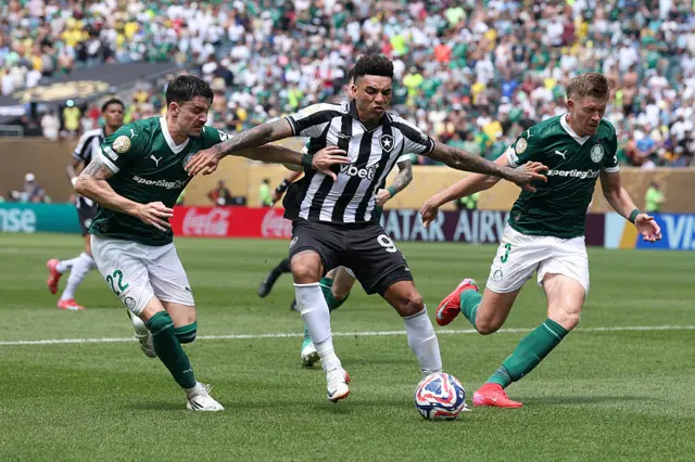 Igor Jesus battles for possession