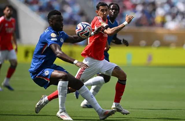 Benoit Badiashile and Benfica's Argentine midfielder #11 Angel Di Maria fight for the ball