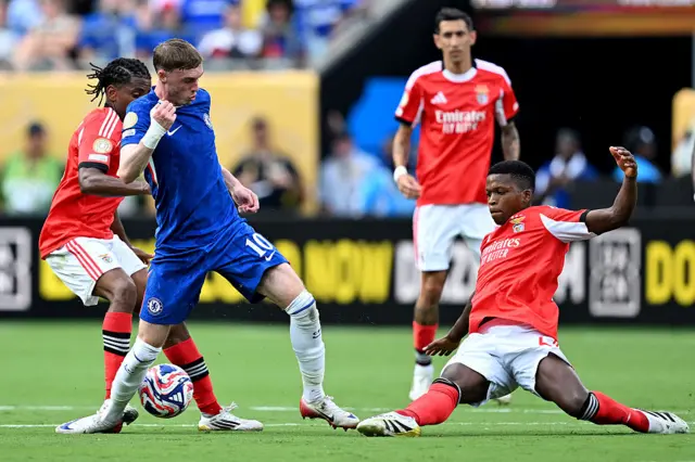 Cole Palmer battles for possession