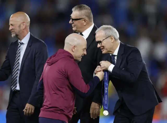 Carsley collects his winners medal