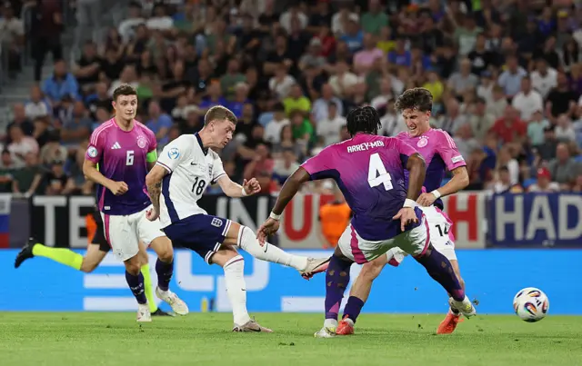 Stansfield is surrounded by defenders as he shoots