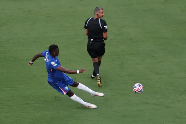 Chelsea's Benoit Badiashile shoots at goal