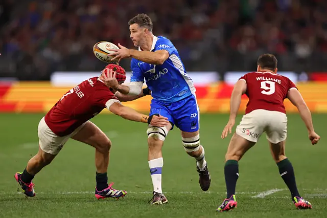 Sam Carter of the Force passes the ball
