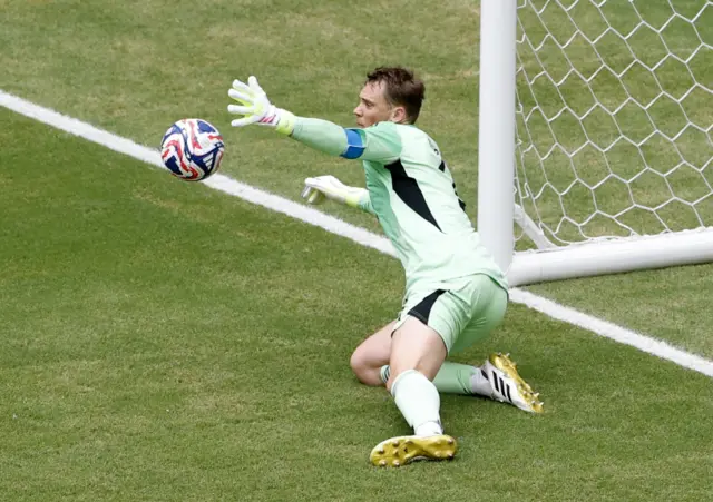 Manuel Neuer makes a save