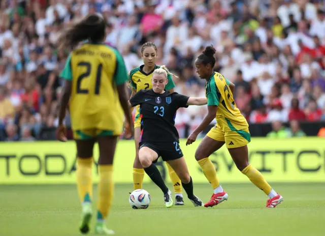Alessia Russo of England (C) in action during the Women's international friendly soccer match between England and Jamaica in Leicester,