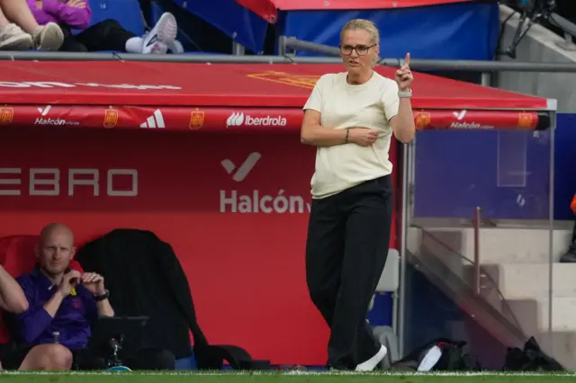 Wiegman points instructions to her players