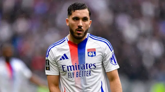 Rayan Cherki of Olympique Lyon looks on