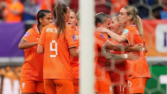 The Dutch celebrate their early goal