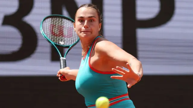 Aryna Sabalenka plays a forehand