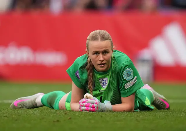 Hampton lies on the floor after conceding