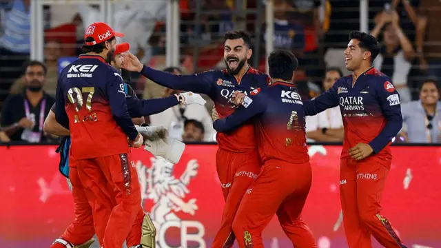 Virat Kohli (centre) celebrating