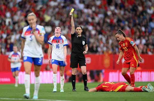 Kearns is booked after a late challenge