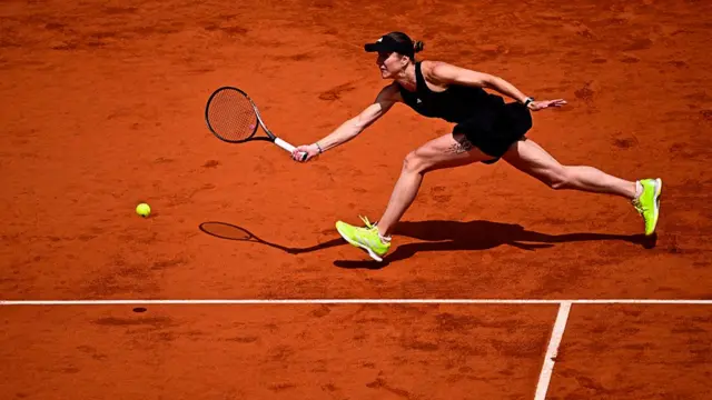 Elina Svitolina plays a forehand return