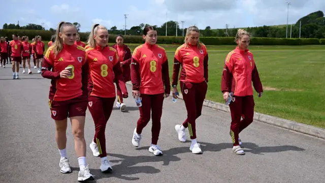 Wales players go for a walk at the Vale Resort before facing Italy