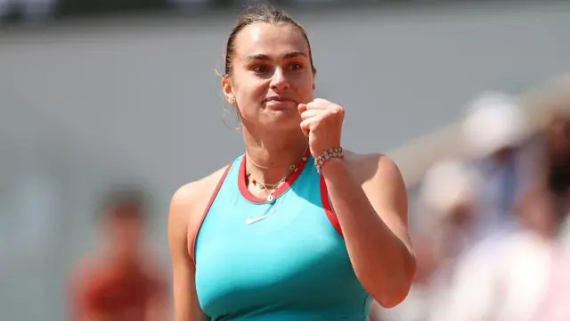 Aryna Sabalenka celebrates a point
