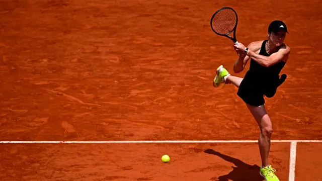Elina Svitolina plays a backhand return