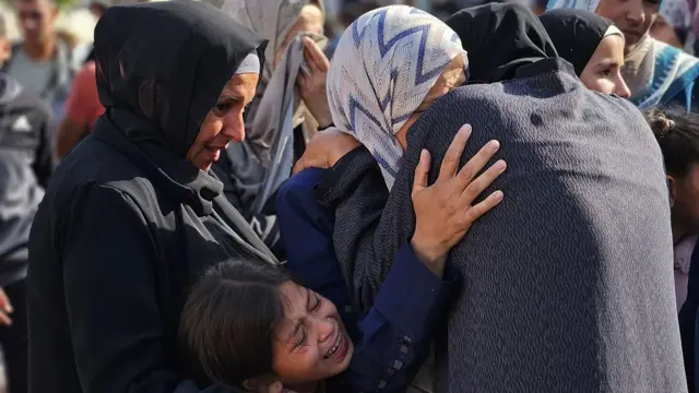 Relatives mourn