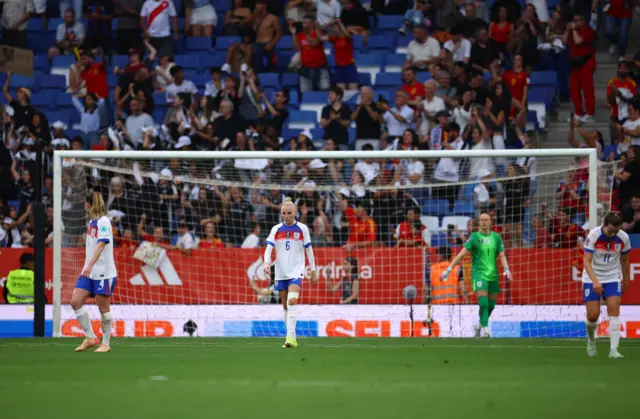 England players trudge back to kick off after conceding again