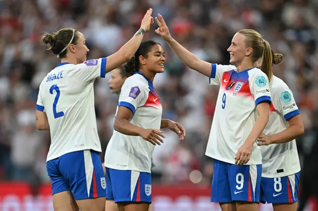 Aggie Beevor-Jones of England celebrates with Lucy Bronze