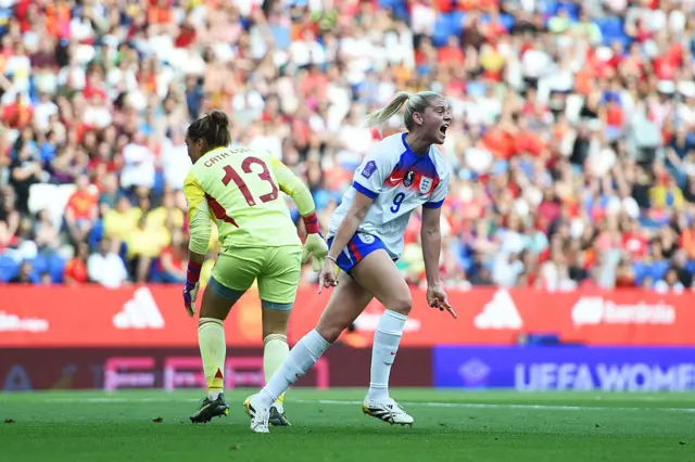 Russo celebrates opening the scoring v Spain