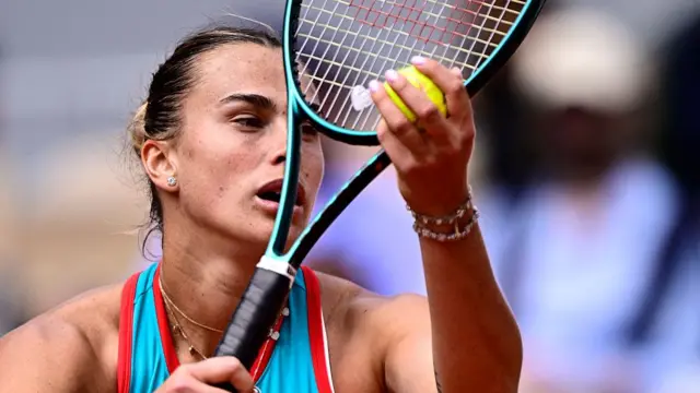 Aryna Sabalenka serves