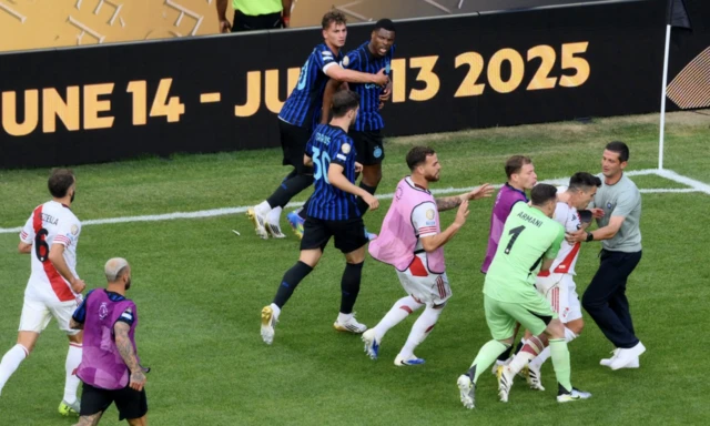 River Plate's Marcos Acuna and Inter Milan's Denzel Dumfries react after the match