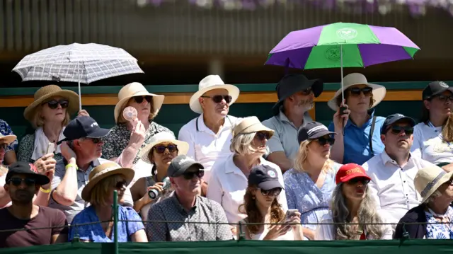 Spectators Spectators were advised to ensure they take time out of the sun while watching the opening day's action at Wimbledon