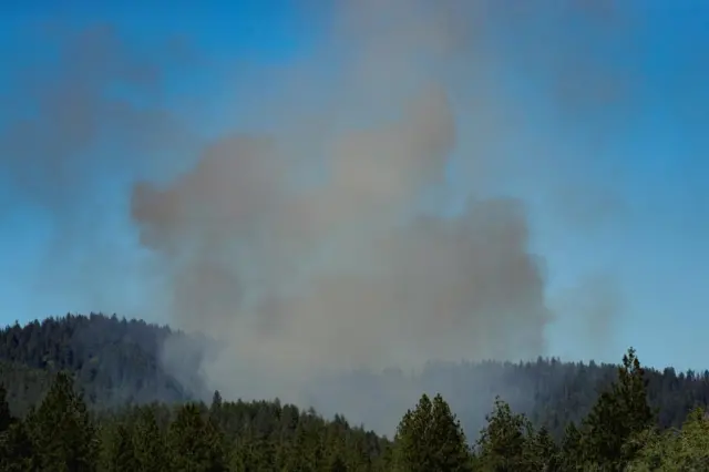 Smoke rises after multiple firefighters were attacked when responding to a fire in the Canfield Mountain area outside Coeur d’Alene, Idaho, U.S. June 29, 2025