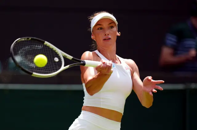 Carson Branstine hits a forehand at Wimbledon