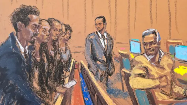 A court sketch shows Sean Diddy Combs turn around to speak to his family