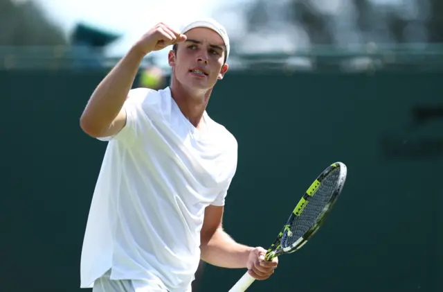 Oliver Tarvet celebrates at Wimbledon
