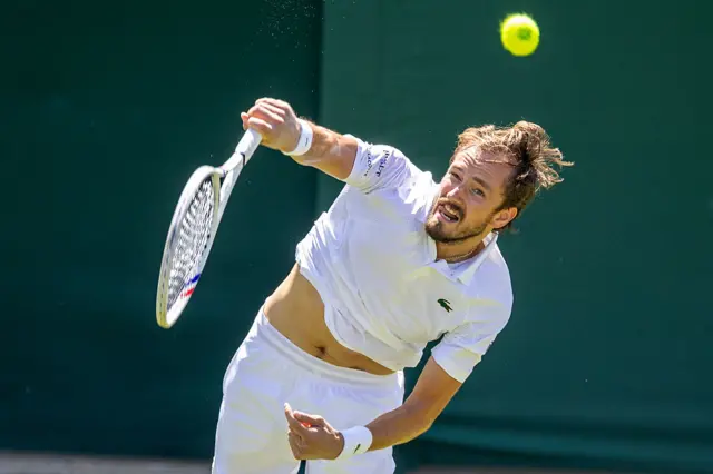 Daniil Medvedev serves at Wimbledon