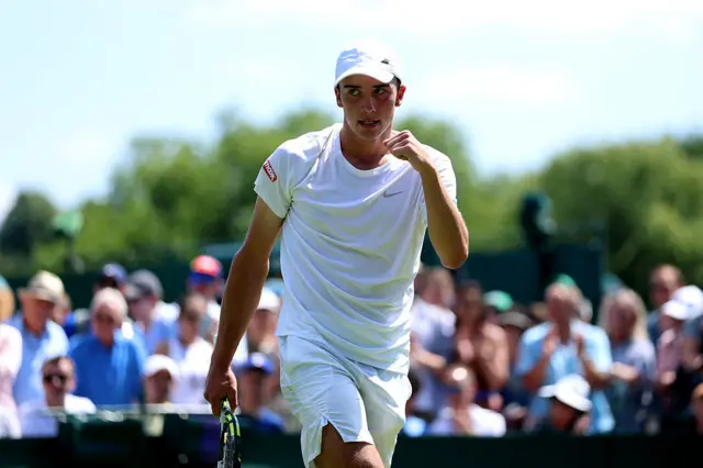 Oliver Tarvet celebrates at Wimbledon