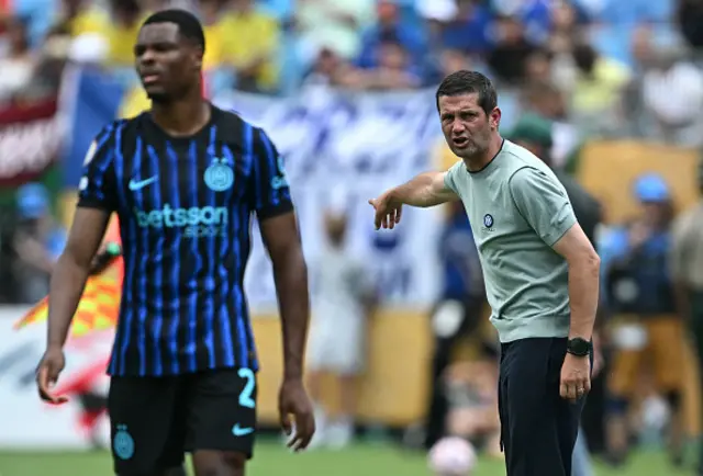 Cristian Chivu (R) gestures