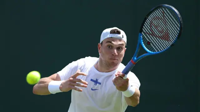 Jack Draper in action during practice at Wimbledon