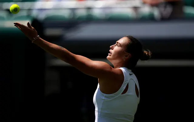 Aryna Sabalenka serves at Wimbledon