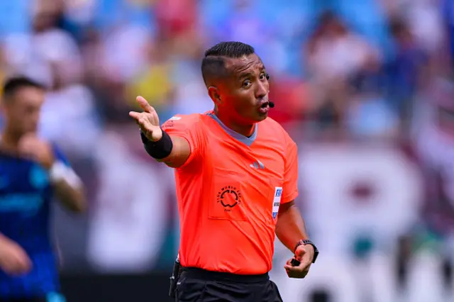 Referee Ivan Arcides gestures