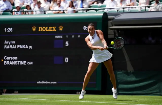 Aryna Sabalenka hits a backhand at Wimbledon