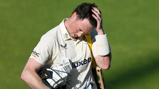 Adam Hose walks off sweating after his 266 from 253 balls