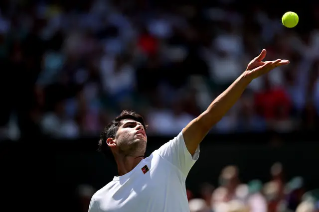 Carlos Alcaraz Serves at Wimbledon