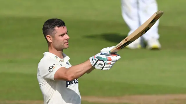 Jake Libby raises his bat