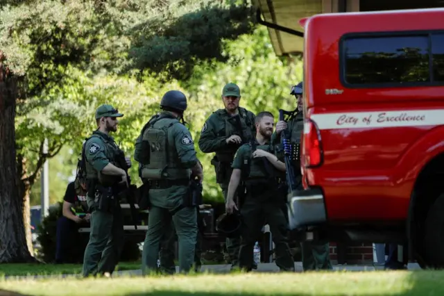 Law enforcement officers gather at Cherry Hill Park after multiple firefighters were attacked when responding to a fire in the Canfield Mountain area outside Coeur d’Alene, Idaho, U.S. June 29, 2025