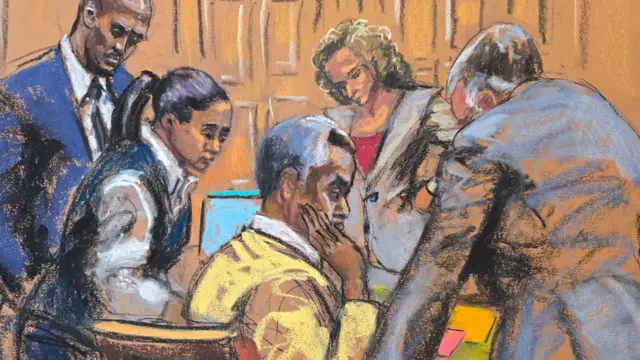Defence attorneys discuss with Sean "Diddy" Combs how to respond to a note sent by jurors, during Combs' sex trafficking trial in New York City, New York, U.S., June 30, 2025 in this courtroom sketch