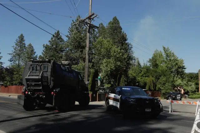 An armoured police vehicle travels towards an area where multiple firefighters were attacked when responding to a fire in the Canfield Mountain area outside Coeur d’Alene, Idaho, U.S. June 29, 2025