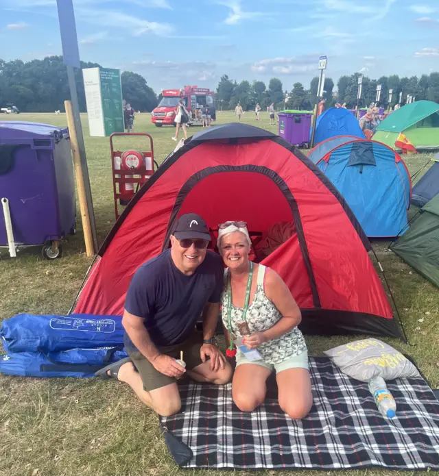 Vicki Broad and her husband at the front of the 2025 queue