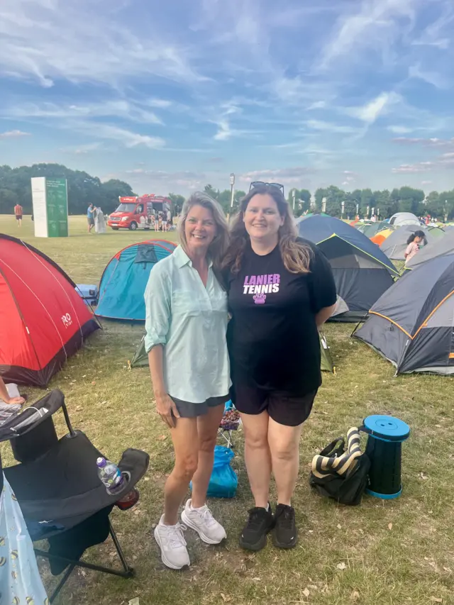 Linda and Aleta from Houston wait in the queue