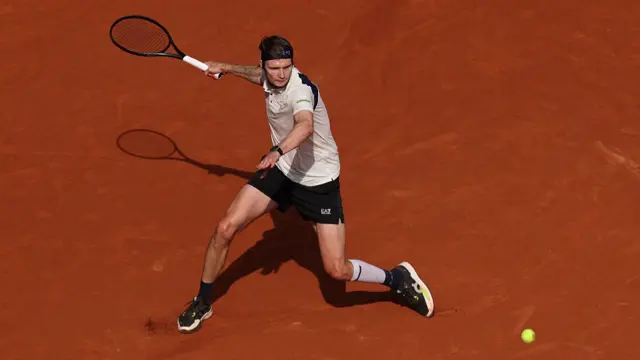 Alexander Bublik plays a forehand