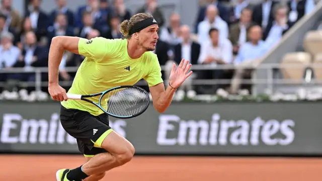 Alexander Zverev runs for a drop shot