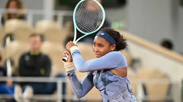 Coco Gauff hits a backhand